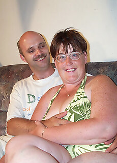 Mature Couple Having Sex On Their Scruffy Couch